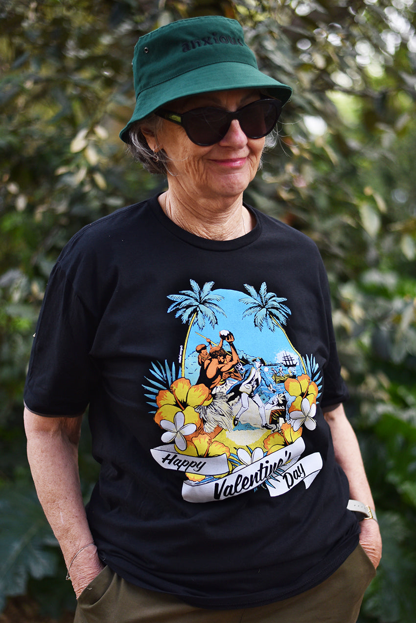 Happy Valentines Day Cook Tee - Commemorate the day Captain Cook landed in Hawaii, got fresh with the Native Hawaiians so they killed him. Too bad, so sad. Pure black soft cotton tee with our beautiful artwork screen-printed on the front. Vibrant colours in a high quality screen-print that means if you treat this baby right it will last a lifetime. 